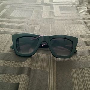 Thick black sunglasses